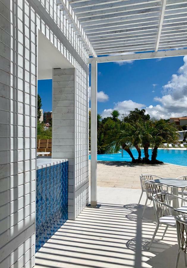 Malibu Foz Hotel - La Maison Younan Figueira da Foz Esterno foto The pool at the hotel
