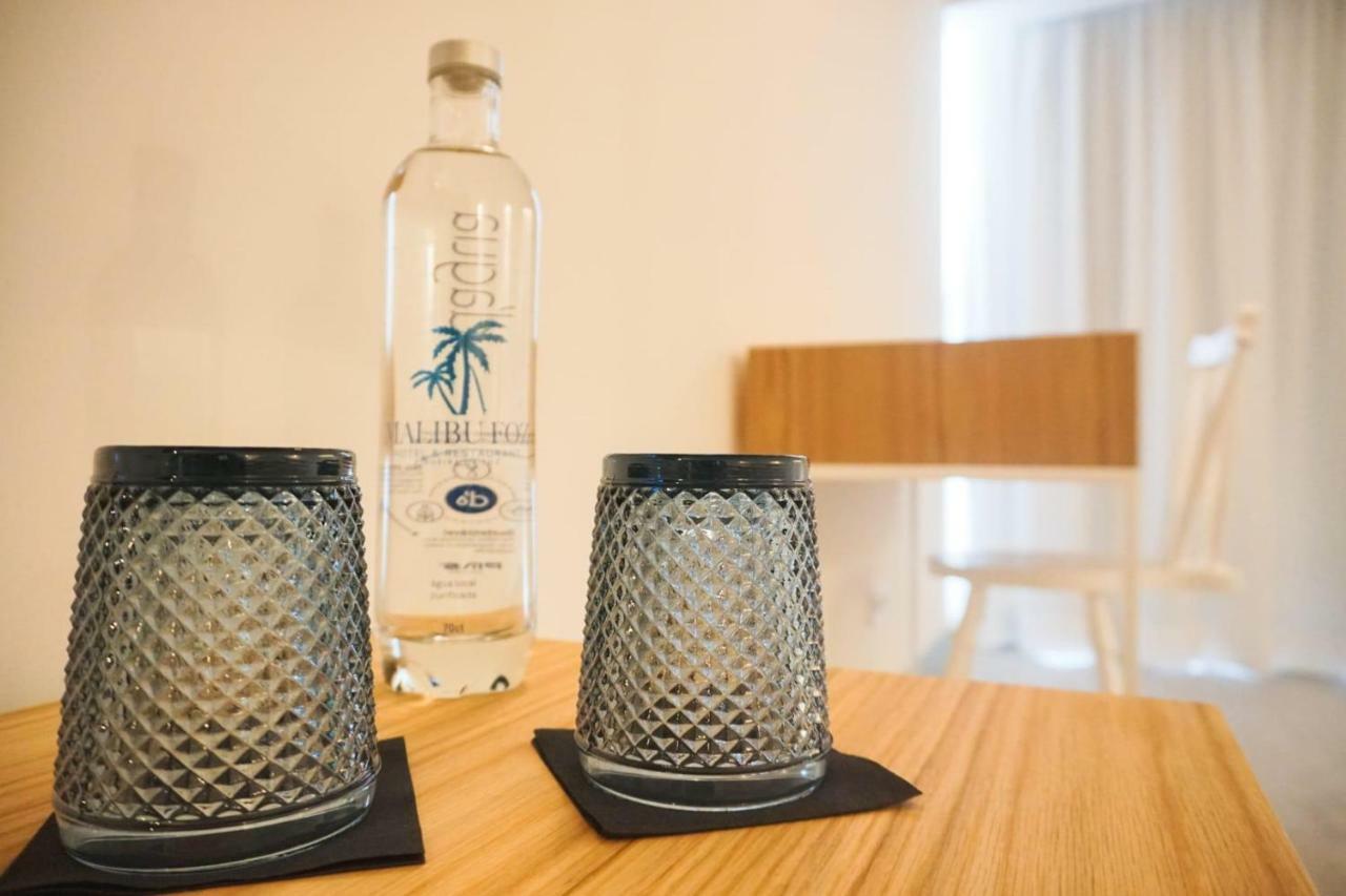Malibu Foz Hotel - La Maison Younan Figueira da Foz Esterno foto A bottle of water