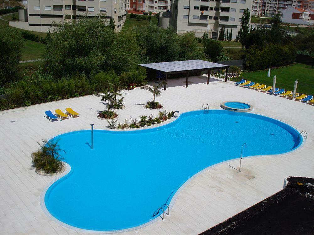 Malibu Foz Hotel - La Maison Younan Figueira da Foz Esterno foto Swimming pool in the complex