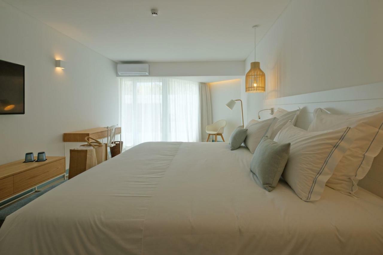 Malibu Foz Hotel - La Maison Younan Figueira da Foz Esterno foto A room at the hotel