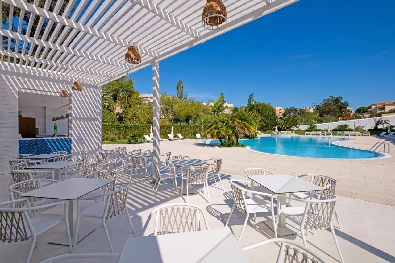 Malibu Foz Hotel - La Maison Younan Figueira da Foz Esterno foto The pool at the hotel